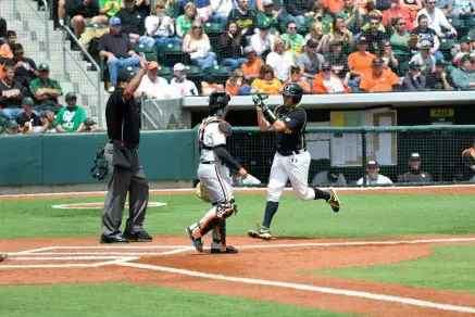Shaun Chase comes around to score the second run for the Ducks.