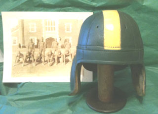 Replica leather football helmet depicting the Ducks' 1940s lids. 