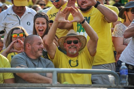 Oregon fans cheer on their beloved Ducks
