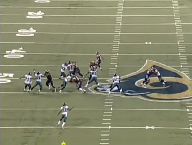 The center uses his superior strength to wash Matthews out of the play.
