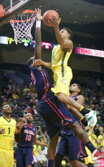 Dillon Brooks drives for two.