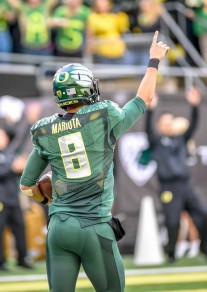 Heisman winner, Marcus Mariota, will try to help the Oregon Ducks get past Florida State in the Rose Bowl. A win for the Ducks would help the Pac 12 bowl record and worsen the ACC record.
