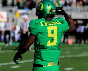 Byron Marshall sporting the new uniforms the Ducks wore for the Rose Bowl